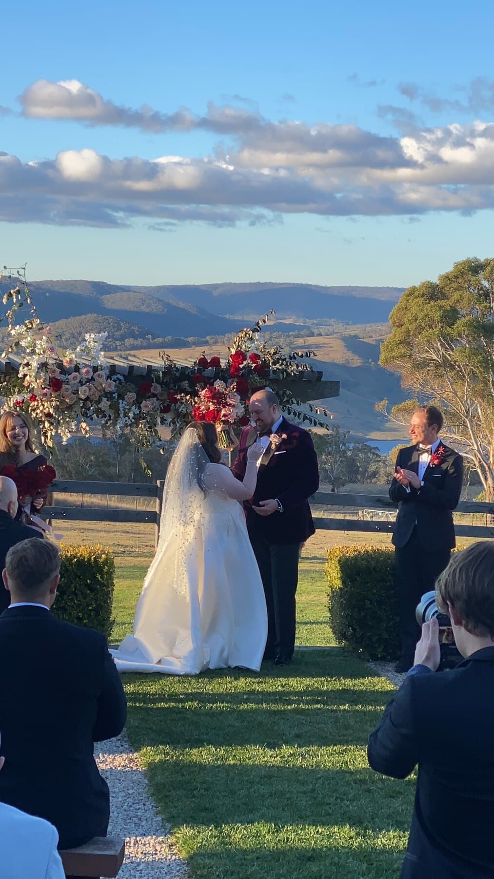 Laura & Andrew, ceremony at Seclusions with the Megalong Valley behind them